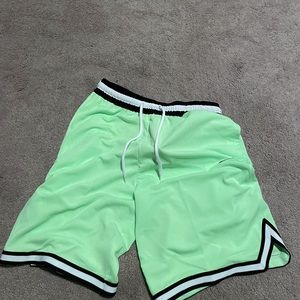 Mint Green shorts with White and Black Bottoms